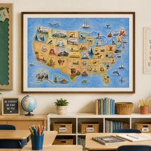 May include: A framed wall map of the United States featuring illustrated landmarks, animals, and regional icons for each state. The map is set against a blue ocean background with a compass rose in the bottom right corner and a dark wood frame.