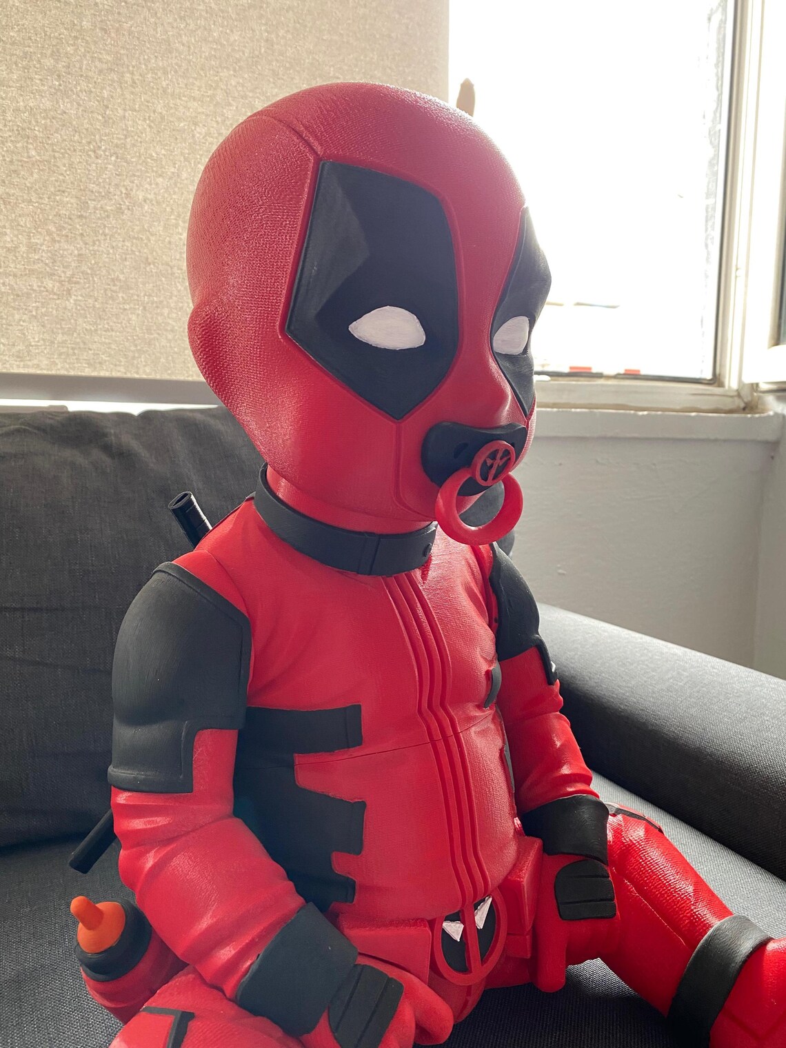 Life Sized Babypool. Baby Deadpool! Pacifier Comes Out, Swords Also ...