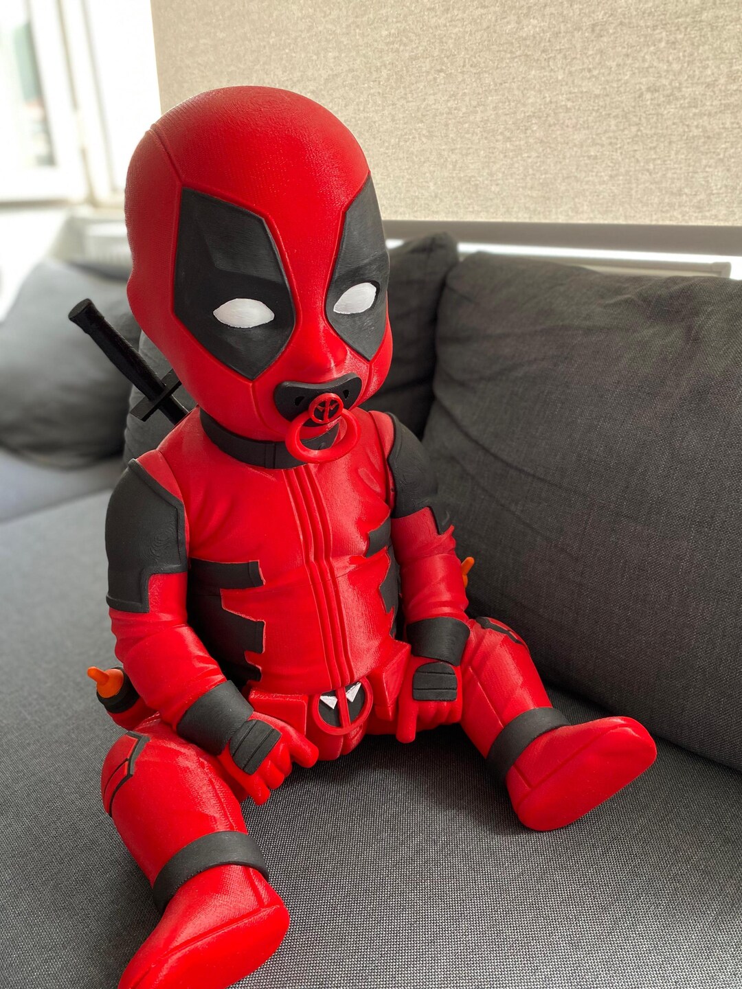 Life Sized Babypool. Baby Deadpool! Pacifier Comes Out, Swords Also ...
