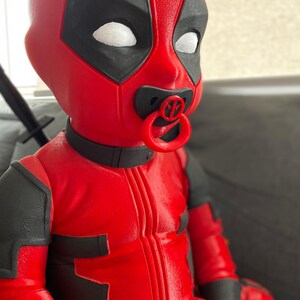 Life Sized Babypool. Baby Deadpool! Pacifier Comes Out, Swords Also ...