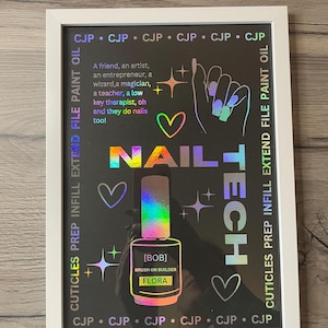 May include: Framed art print with a black background and holographic accents. The print features the words "NAIL TECH" and a nail polish bottle. Text includes "CUTICLES PREP INFILL EXTEND FILE PAINT OIL" and a quote about nail technicians.
