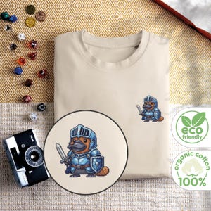 Platypus Paladin T-Shirt | Funny Pixel Art Tee | 8-Bit Fantasy Gaming Shirt | Organic Cotton Unisex Gift for Gamers & Animal Lovers