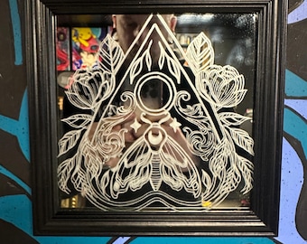 Espejo grabado a mano