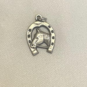 vintage Sterling Silver horseshoe with horse head charm made in Mexico