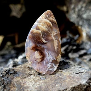 Plume agate purple cabochon