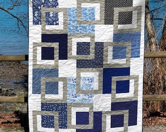Floating Windows – Midnight Frames quilt pattern PDF. Easy modern patchwork design for beginners.