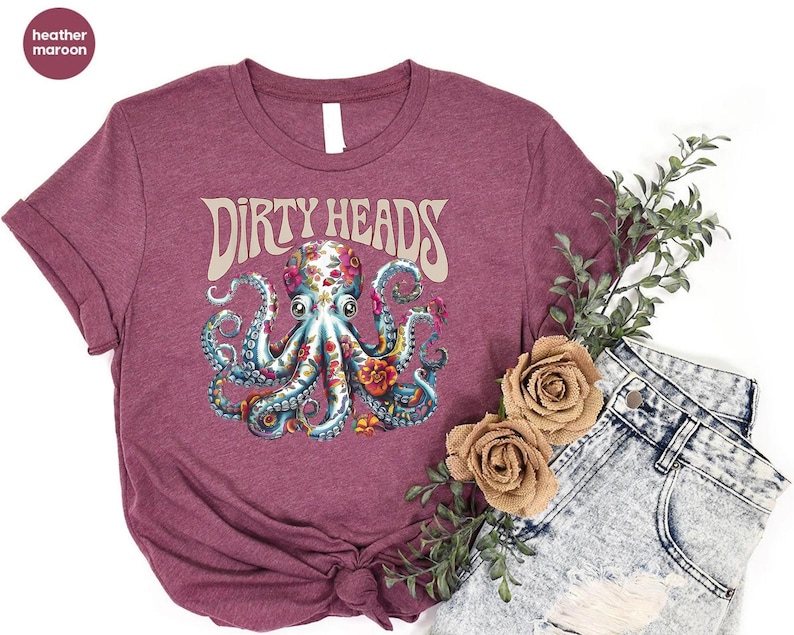 a purple shirt with an octopus on it