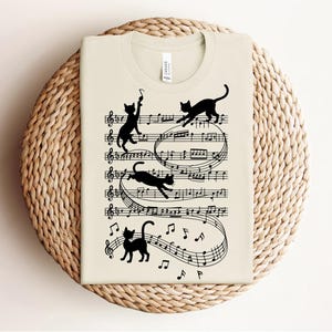 Cat Sheet Music Shirt – Funny Musical Cat Tee – Black Cats on Music Notes – Musician Gift – Kitty Orchestra Shirt – Cat Lover Band Tee