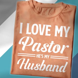 I Love My Pastor He’s My Husband Shirt – Funny Pastor Wife Gift – Faith-Based Christian Tee – Church Couple Matching Shirt – Religious Shirt