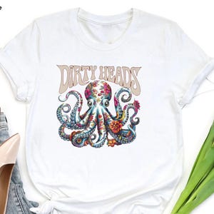 a white shirt with an octopus on it
