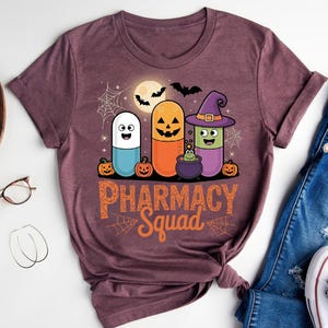 Pharmacy Squad Shirt – Halloween Pill Graphic Tee – Spooky Pharmacist T-Shirt – Fun Halloween Gift for Pharmacy Lovers