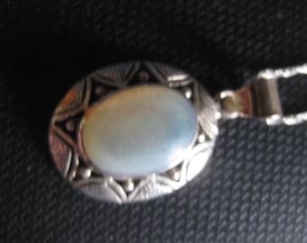 Necklace Of A Moonstone Charm And Silver Chain
