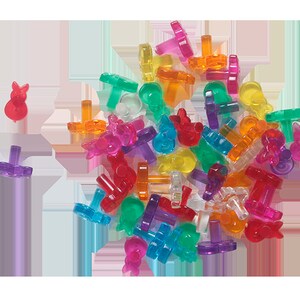 May include: A collection of colorful plastic Christmas light bulb replacements. The bulbs are in various shapes and sizes, including stars, bells, and ornaments. The bulbs are all clear and have a variety of colors, including red, green, blue, yellow, and orange.