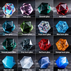 May include: A collection of sixteen faceted glass and crystal objects in various colors, including pink, blue, green, and red. Each piece is labeled with its name, such as "Prism glass" and "Blue cats eye."