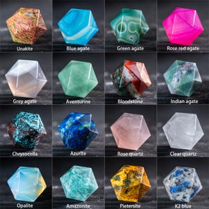 May include: A grid of sixteen faceted gemstone specimens, each with a unique color and pattern. The gemstones include Unakite, Blue agate, Green agate, Rose red agate, Grey agate, Aventurine, Bloodstone, Indian agate, Chrysocolla, Azurite, Rose quartz, Clear quartz, Opalite, Amazonite, Pietersite, and K2 blue.