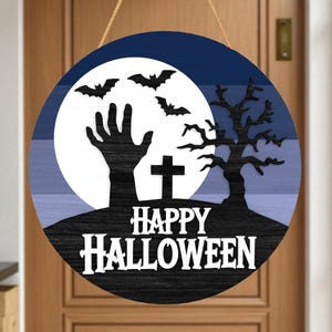 May include: Round Halloween wooden sign with a blue and white background, featuring a full moon, bats, a zombie hand, a cross, and a bare tree. The words "HAPPY HALLOWEEN" are in white.