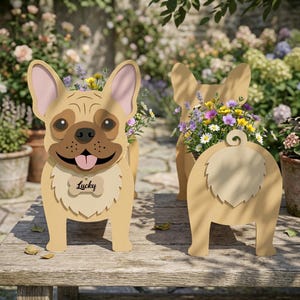 May include: Wooden dog-shaped planters in a light brown color, filled with colorful flowers. The front-facing planter has a smiling face and a tag that says "Lucky". The planters are on a wooden table in a garden setting.