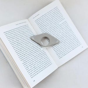 DIY book page holder made with slab pottery template, handmade ceramic reading tool