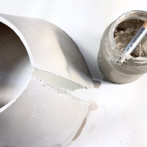 Building process of a handbuilt noodle bowl, showing rim detail and authentic texture from slab construction. Good reference for pottery beginners.