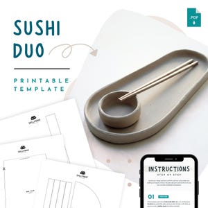 Può includere: Un set di tre tazze in ceramica con finitura opaca e macchiettata. Le tazze sono nei toni del crema, grigio chiaro e grigio scuro. Ogni tazza ha un design semplice e minimalista, ideale per caffè o tè.