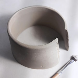 Slab pottery wall section for storage jar | pre-shaped clay wall with clean edge | ceramic container in progress