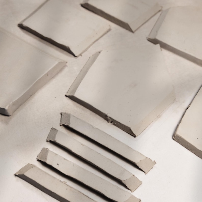 Cut-out clay pieces for DIY tealight house | slab pottery in progress using printable PDF template | ceramics for beginners