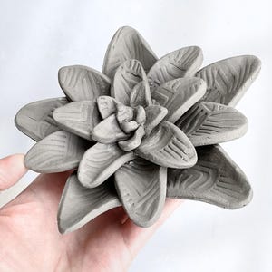 clay flower made with a succulent pottery template
