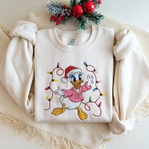 Embroidered Daisy Very Merry Xmas Party Sweatshirt, Mickey and Friends Disney Christmas Lights Shirt, Family Matching Shirt, Christmas Gift