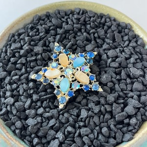 Vintage Starburst Rhinestone Brooch – Blue & Iridescent Stones – Silver Tone Pin – Mid-Century Costume Jewelry