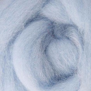 May include: Close-up of pale blue wool roving, a soft, fluffy material. The fibres are tightly packed, creating a dense texture. The colour is a muted blue, with subtle variations in tone. Suitable for fibre art projects, such as needle felting or spinning.