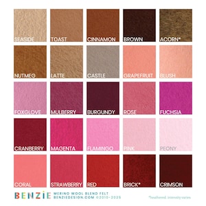 May include: A colour chart of 20 merino wool blend felt swatches in various shades of brown, pink, red, and orange. The swatches are labelled with names such as "Seashore", "Toast", "Cinnamon", "Brown", "Acorn", "Nutmeg", "Latte", "Castle", "Grapefruit", "Blush", "Foxglove", "Mulberry", "Burgundy", "Rose", "Fuchsia", "Cranberry", "Magenta", "Flamingo", "Pink", "Peony", "Coral", "Strawberry", "Red", "Brick", and "Crimson".