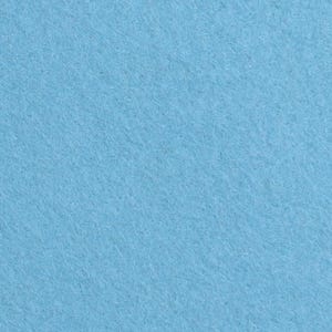 May include: A close-up shot of a solid light blue felt fabric. The texture is soft and slightly uneven, with a subtle, matte finish. The color is a bright, clear blue, filling the entire frame.