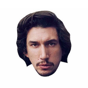 May include: A close-up portrait of a person with dark brown hair and a serious expression. The person has a strong jawline and piercing blue eyes.