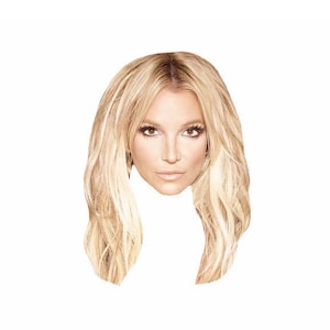 May include: A close-up of a woman with long, wavy, light blonde hair. She is looking directly at the camera with a neutral expression.