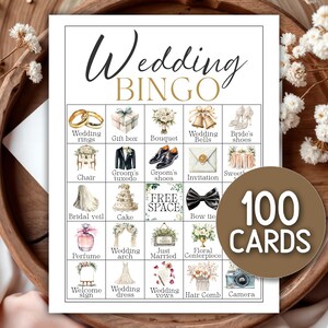 May include: A wedding bingo game card with illustrations of wedding-related items like rings, a cake, and a tuxedo. The card reads "Wedding BINGO" and includes a circular label that says "100 CARDS".