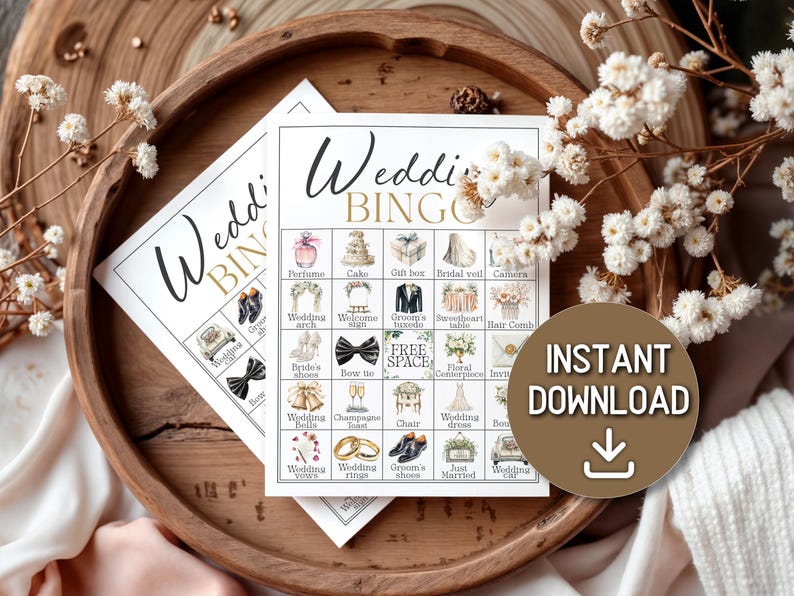 May include: Two wedding bingo cards with illustrations of wedding-related items like perfume, cake, and rings. The cards are on a wooden tray with white flowers and the words "Wedding Bingo" in elegant script. A brown circle with the words "Instant Download" is on the right.