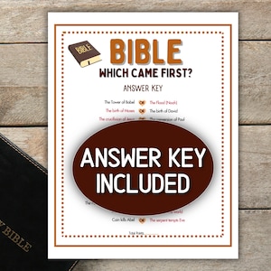 May include: A printed game sheet with the title "BIBLE WHICH CAME FIRST?" and an "ANSWER KEY INCLUDED" label. The sheet features a brown border and a wooden background. A closed black Holy Bible is visible on the left.