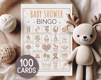 May include: A baby shower bingo game card with a brown and white design, featuring illustrations of baby-related items. The card includes the text "Baby Shower Bingo" and "100 Cards". A crocheted deer and yarn balls are also in the image.