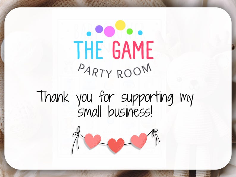 May include: A white card with the words "THE GAME PARTY ROOM" in colourful letters. The text "Thank you for supporting my small business!" is below. Three red hearts are strung across the bottom.