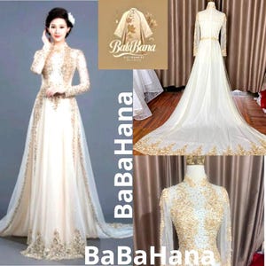 May include: A cream-colored, long-sleeved gown with gold embroidery and embellishments. The dress features a high neckline and a flowing skirt with a train. The image includes the text "BaBaHana" in a stylized font.