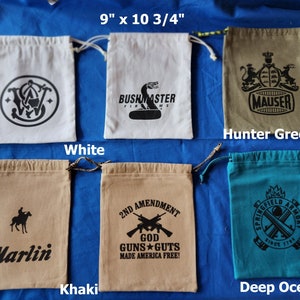 May include: Five drawstring bags in different colors with various logos printed on them. The bags are 9 inches by 10 3/4 inches. The colors are white, khaki, hunter green, and deep ocean.