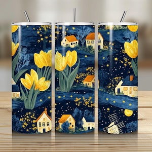 May include: A set of three stainless steel tumblers with a wrap-around design featuring a nighttime village scene. The design includes yellow tulips, small houses, trees, and a starry sky in shades of blue and yellow. Each tumbler has a silver straw.