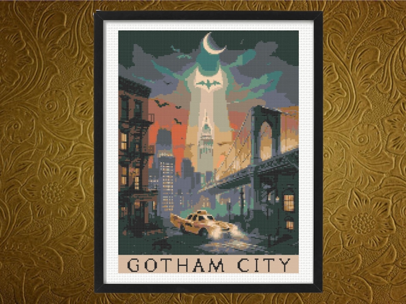 May include: A framed cross-stitch pattern depicting a cityscape at twilight with a yellow taxi in the foreground, a bridge on the right, and a bat signal in the sky. The text GOTHAM CITY is printed in black capital letters at the bottom of the image.