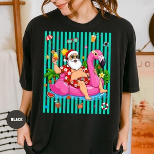 Santa Summer Vacation Shirt, Funny Beach Santa T-Shirt, Tropical Flamingo Pool Float Tee, Christmas in July Gift for Her