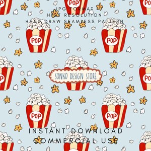 May include: A seamless pattern featuring red and white popcorn buckets with the word "POP" on them, surrounded by popcorn kernels and star-shaped flowers on a light blue background. The text "SONKO DESIGN STORE" is also present.
