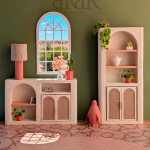 May include: A decorative interior scene featuring a white cabinet with a pink shelf, a matching lamp, and a window. The scene includes a pink penguin statue, plants, and a round rug. The background is a green wall. The text "erredoblez" is visible.