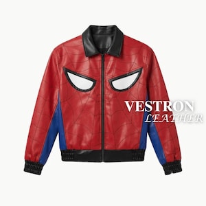 May include: A red and blue leather jacket featuring a black collar, black waistband, and black cuffs. The front displays a black spiderweb pattern and two large white eye-shaped patches. The text VESTRON LEATHER is printed on the right side.