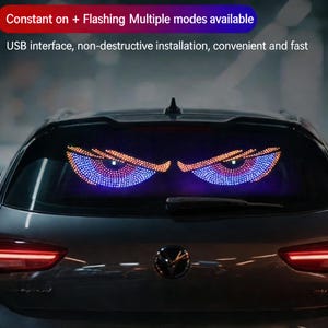 May include: A car's rear window features a pair of illuminated, stylized eyes. The eyes are composed of small, colourful lights, with blue and purple tones in the irises and orange accents. Text at the top reads "Constant on + Flashing Multiple modes available".