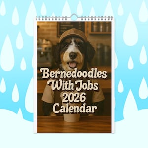 May include: A 2026 calendar featuring a Bernedoodle dog wearing a barista uniform. The calendar has a spiral binding and displays the text "Bernedoodles With Jobs 2026 Calendar" in a brown, vintage-style font. The background shows a coffee shop setting.