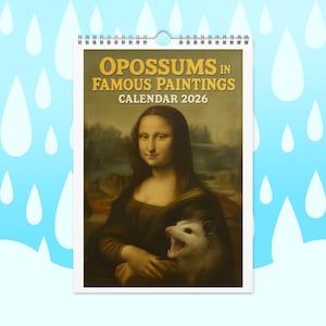 May include: A calendar titled "Opossums in Famous Paintings Calendar 2026" featuring a parody of the Mona Lisa with an opossum. The calendar has a white border and a silver spiral binding at the top. The background is a light blue with white raindrop shapes.